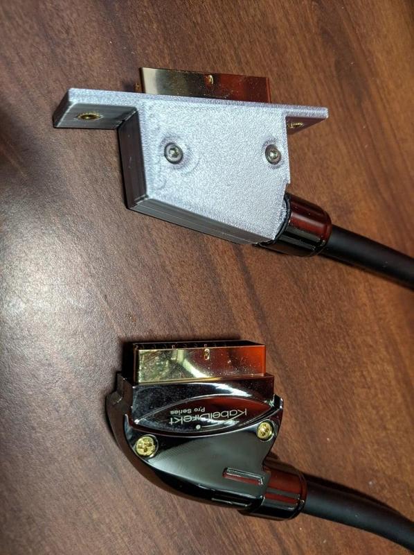 Bracketed SCART connector shroud with M4 screw holes for RetroTINK-4K