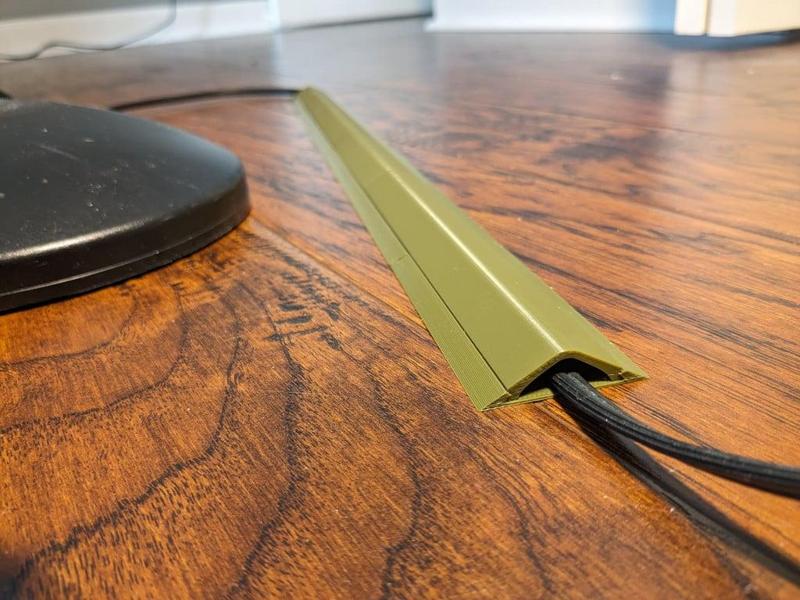 Compact Cord Cover for hard floor