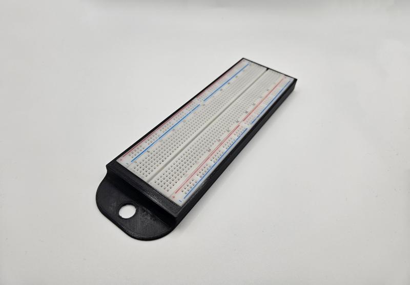 Breadboard wall holder