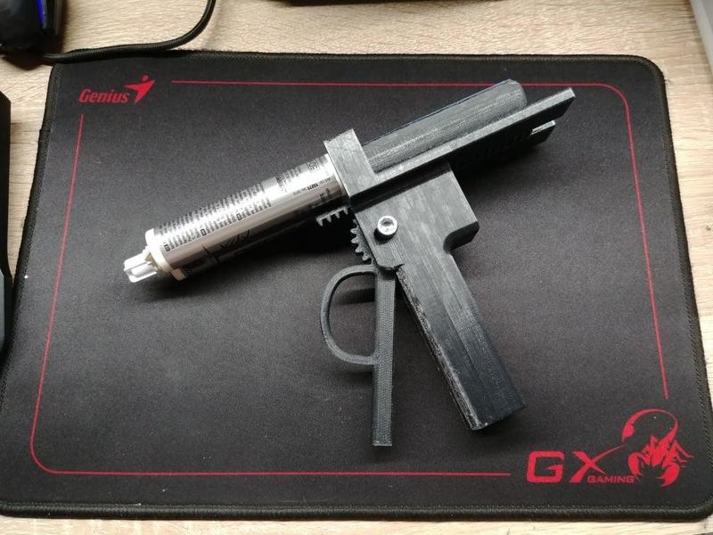 Two component adhesive dispensing gun