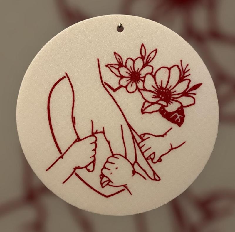 triplets holding mums hand wall art