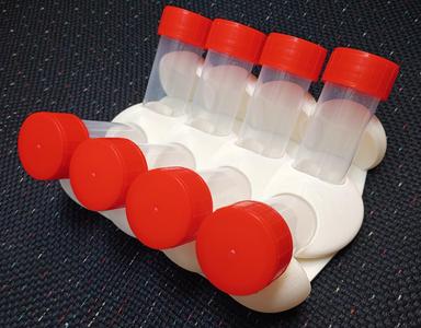 Stand for eight 30mm tubes inclined at 45 degrees in mushroom style design.