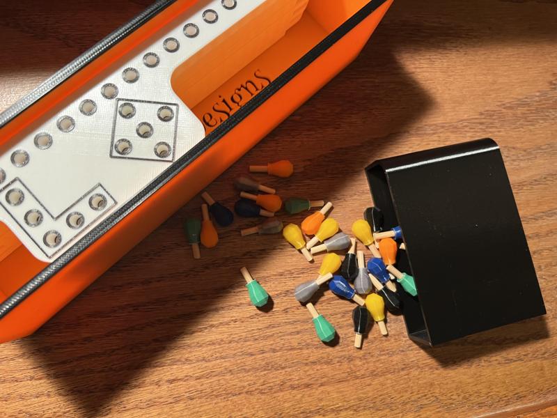 Pegs and Jokers Board Game Box Inside box for pegs