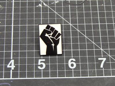 Black Fist Enamel pin