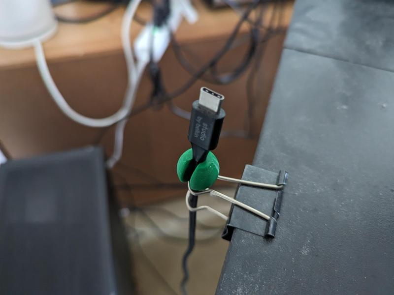 Snap on ball stop for USB cable