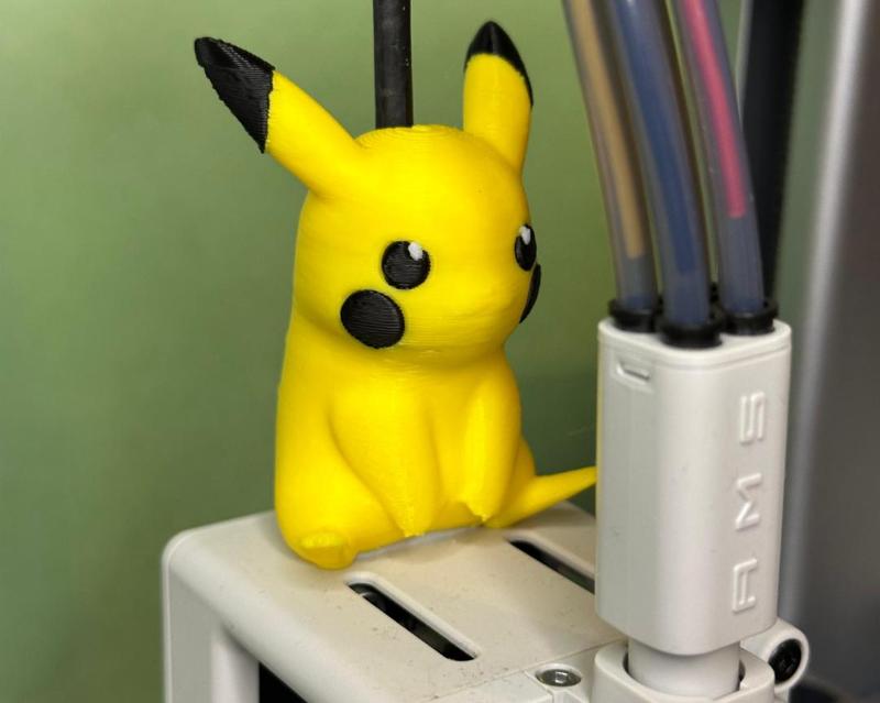 Pikachu Pokémon sitting on the print head