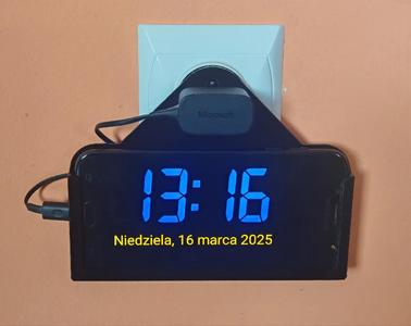 A smartphone holder - turn an old smartphone to an alarm clock (at a wall socket)   