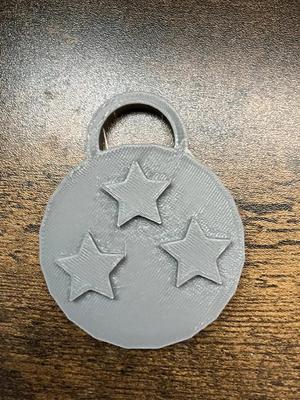 medal with 3 stars   
