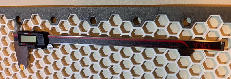 Compact Sideways Caliper Mount for Honeycomb Storage Wall   