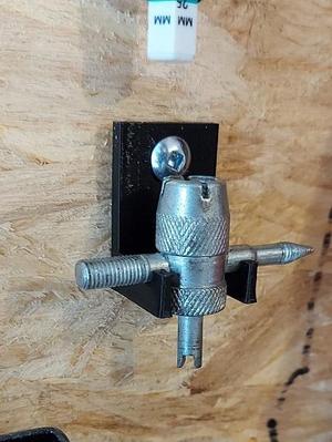 Tire valve tool holder
