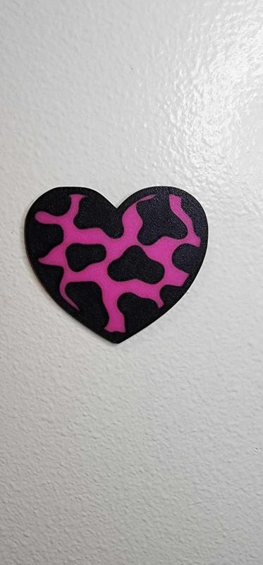 Cow print heart wall decor
