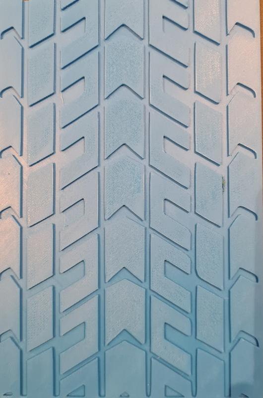 Tire tread impression