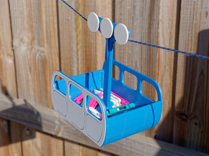 Cable car clothes peg basket