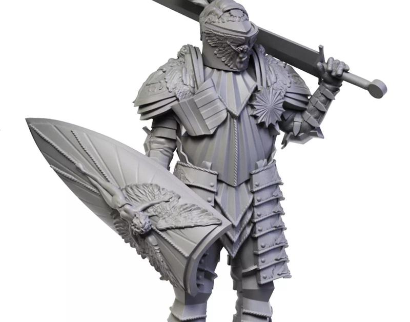 Knight in armor holding sword