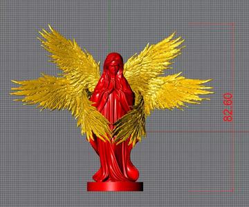 Statue of Virgin Mary with angel wings