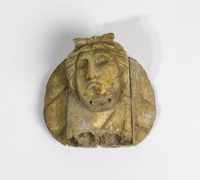 Carving of a human head