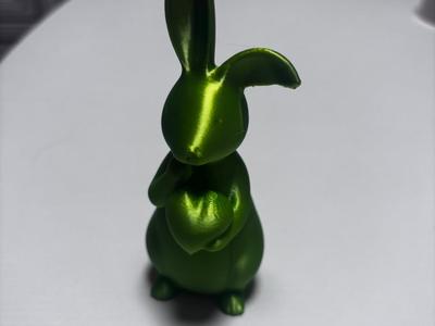 Easter bunny holding a heart
