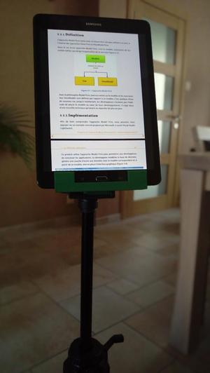 Tablet holder for photographic tripod