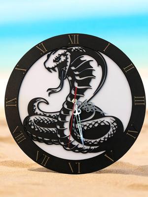 snake clock, laser-cut cobra