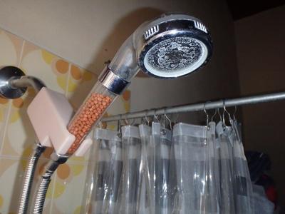 Shower head clip / mount