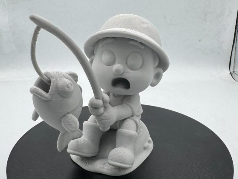 Cute Chibi Fisherman catching a fish