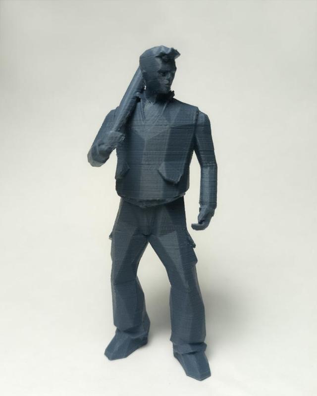 A posed figurine of Claude from GTA 3 (with Baseball bat)