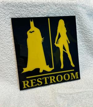 batman+wonder woman-restroom sign