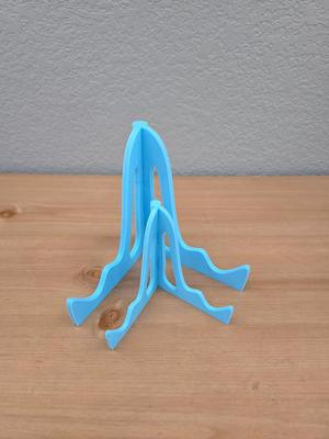Fold out phone or picture holder