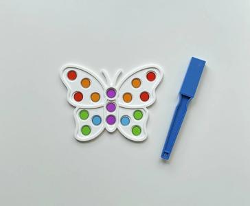 Vlinder voor magneetfiches of stapeldopjes