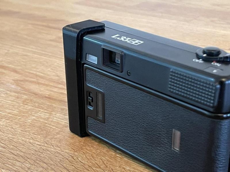 Nikon L35AF battery flap door fix