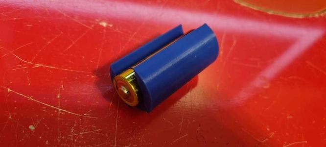 C-size battery to AA adapter