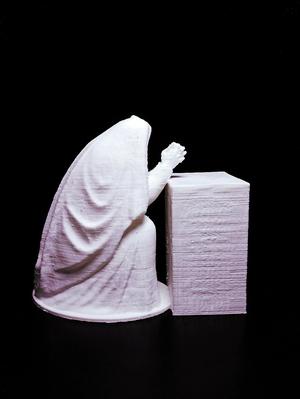 Gravestone Depicting Woman Praying