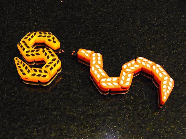 Snake.... Jointed so it wriggles off the build plate!