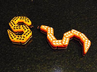 Snake.... Jointed so it wriggles off the build plate!