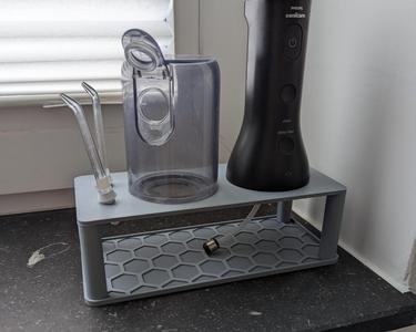 Drying stand for water flosser