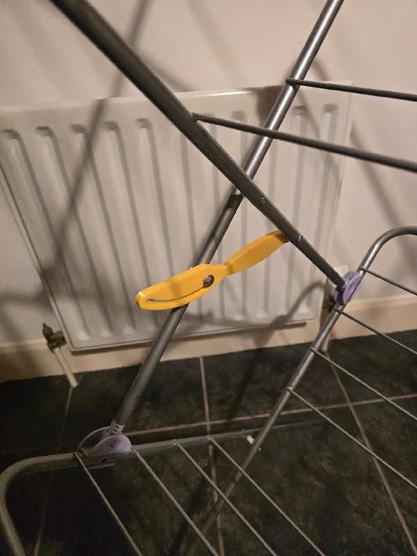 Clothes dryer lock handle   