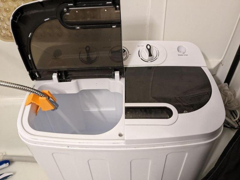 Apartment mini washer hose clip