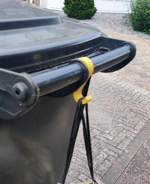 Garage bin bag holder