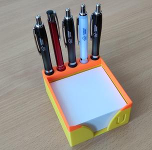 A pencil and paper holder