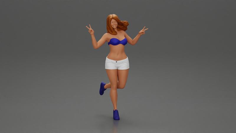 happy girl in a bra  and shorts, jumping on one leg