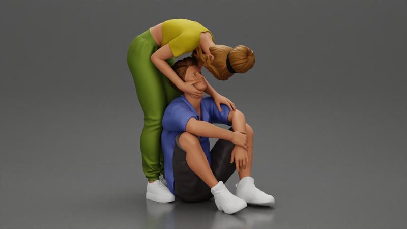 girl standing behind her boyfriend gently touching his face while he sits on the floor in shorts with his hands on his knees