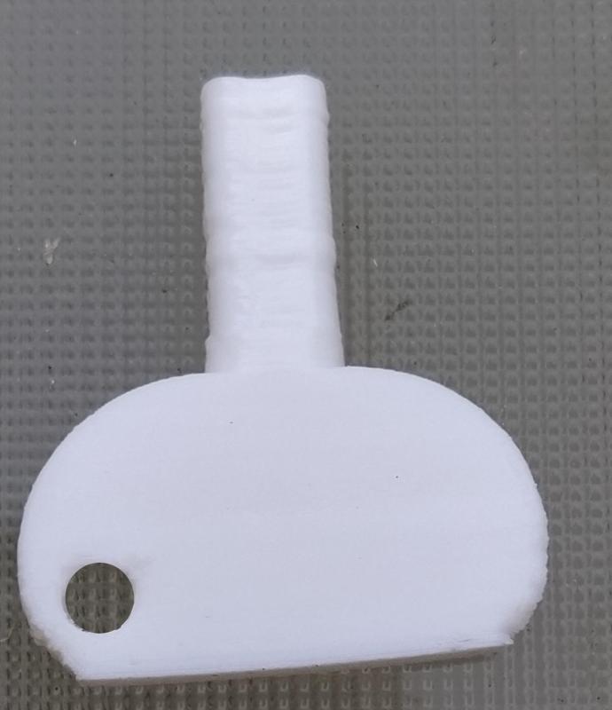 Key for paper dispenser