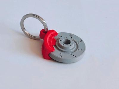 Rotating brake disc keychain