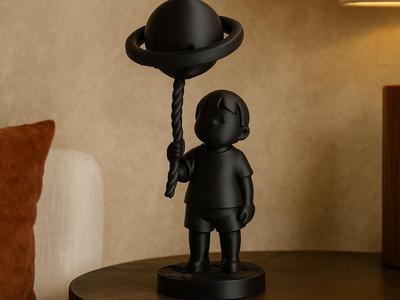 Boy with Planet Balloon – Black Poetic Sculpture