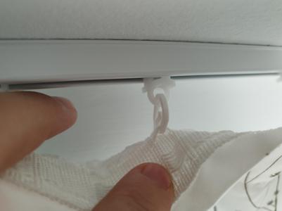 Curtain hook and curtain track ring