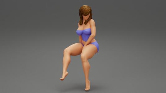 Beautiful Woman Sitting On Stool