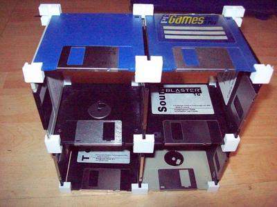 reuse your old floppy discs as a shelf 