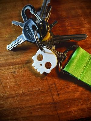 Bullet Hole Skull Keychain