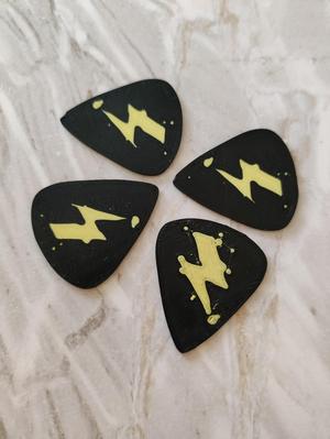 The Warning guitar pick