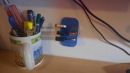 Wall mounted usb holder